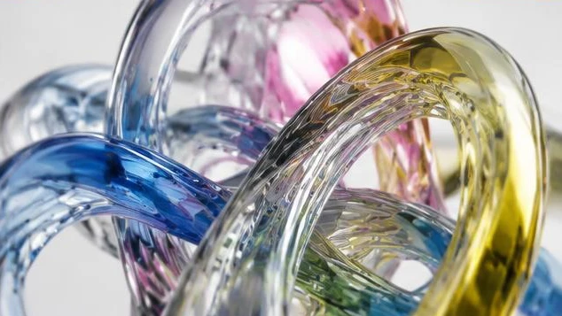 Abstract interrelated forms accompanying questions about Creative Asset Specifications